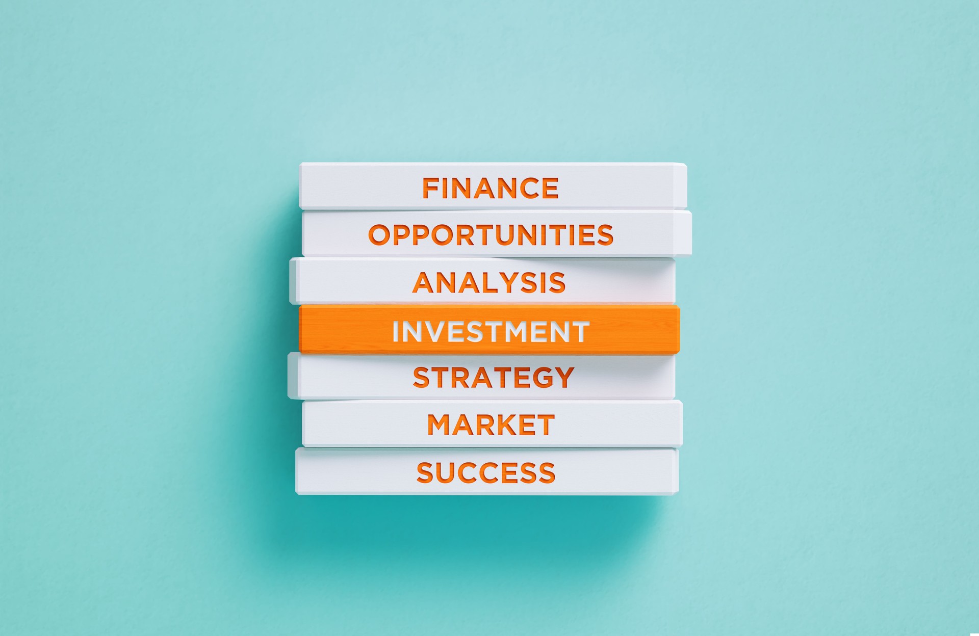 Investment Related Words Written Wood Blocks On Blue Background - Investment Concept